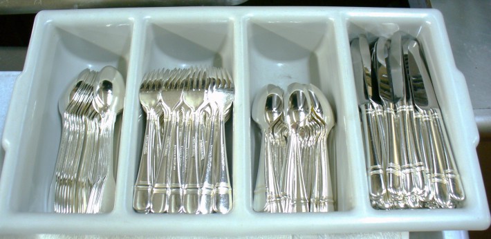 Polishing silver for hotel and restaurant diningware